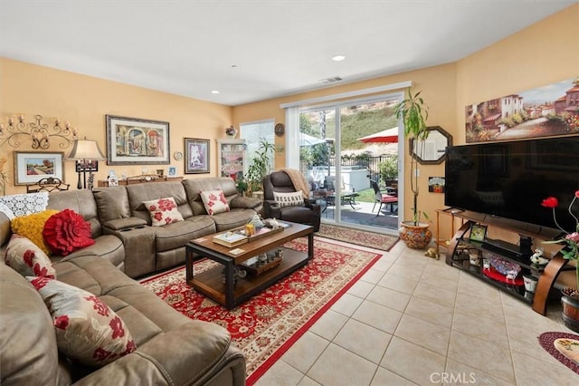 living room with light tile patterned flooring