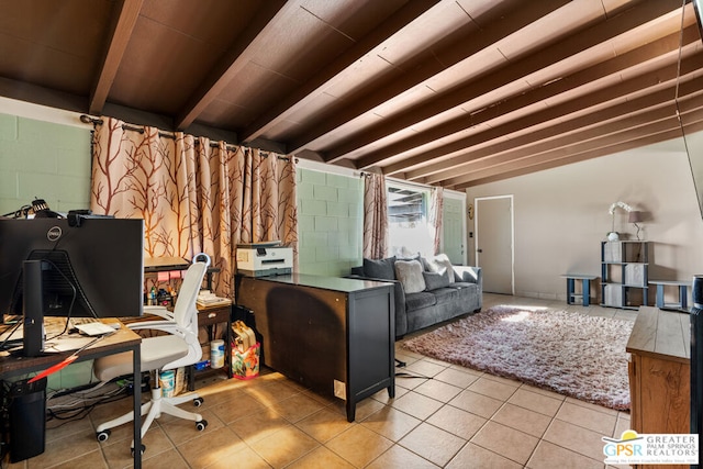 office space with beam ceiling and light tile patterned floors