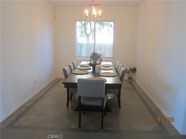 dining area with a chandelier