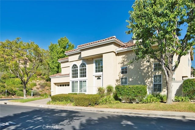 exterior space with a garage