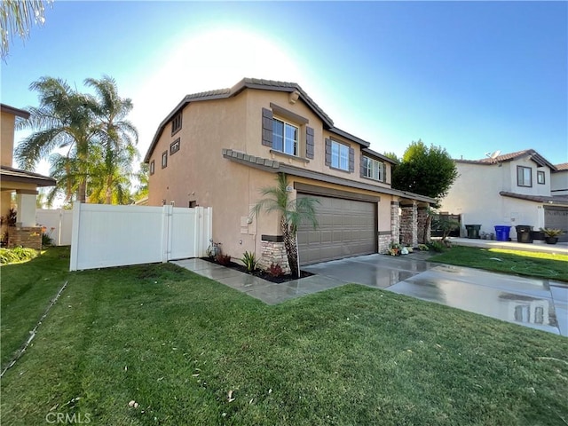 view of front of home with a garage and a front yard