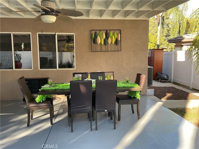 view of patio with ceiling fan and cooling unit