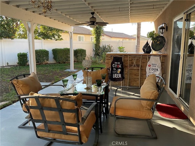 view of patio with ceiling fan