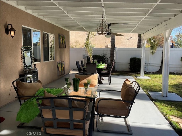 view of patio / terrace featuring ceiling fan