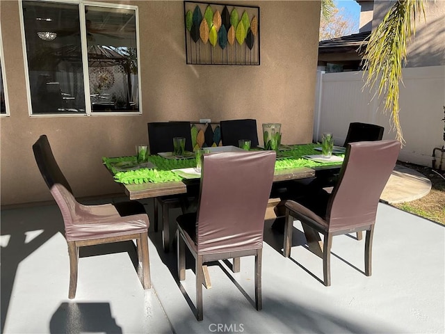 dining room featuring concrete flooring