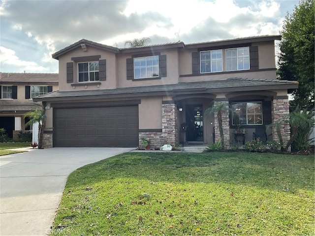 view of front of home featuring a garage and a front lawn