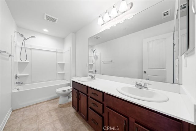 full bathroom with tile patterned floors, vanity, bathtub / shower combination, and toilet