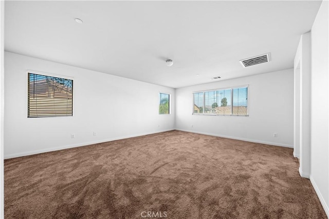 spare room with carpet flooring