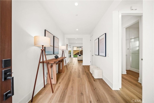 corridor featuring light wood-type flooring