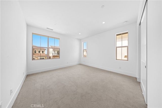 view of carpeted spare room