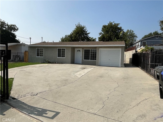 ranch-style home with a garage