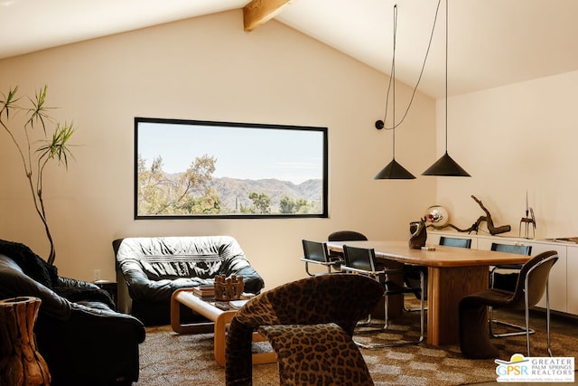 interior space with a mountain view, carpet flooring, and vaulted ceiling with beams