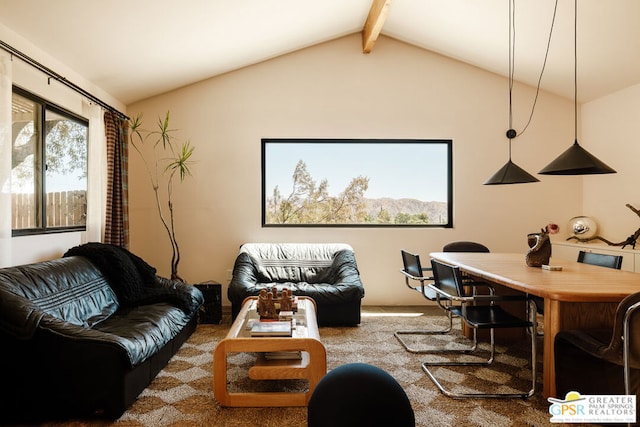 living room with carpet and vaulted ceiling with beams