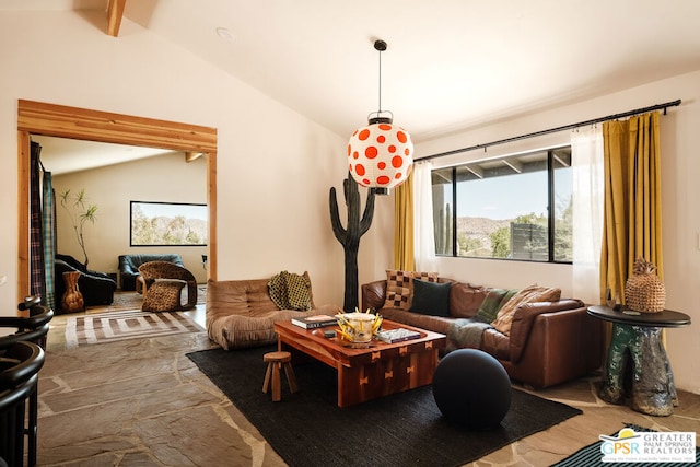 living room featuring vaulted ceiling with beams