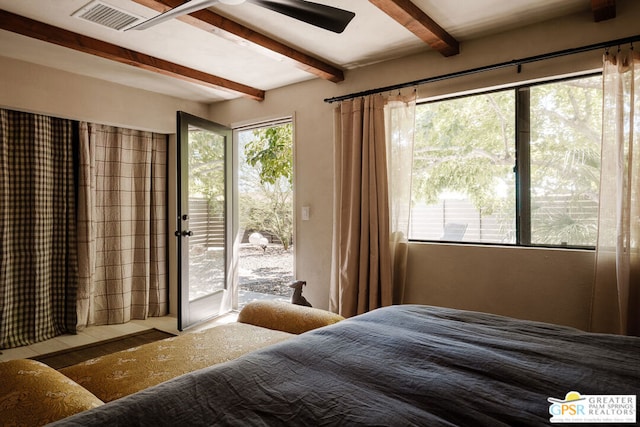 bedroom with ceiling fan, access to exterior, and beam ceiling