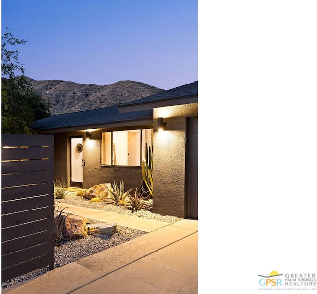 view of front of house with a mountain view