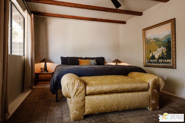 bedroom featuring beam ceiling and ceiling fan