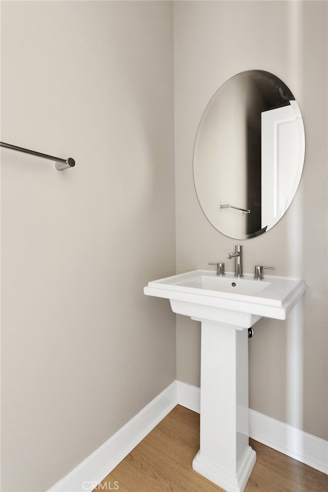 bathroom featuring hardwood / wood-style flooring