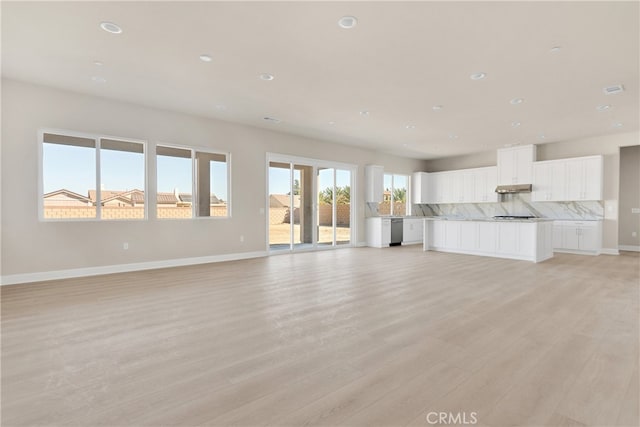 unfurnished living room featuring light wood-type flooring