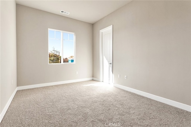 view of carpeted spare room