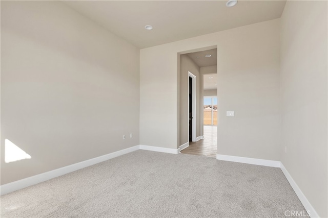 empty room featuring carpet flooring