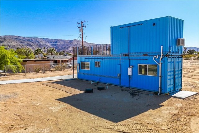 exterior space featuring a mountain view