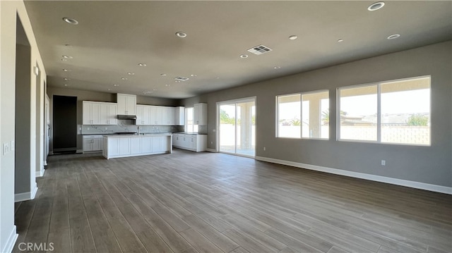 unfurnished living room featuring light hardwood / wood-style flooring