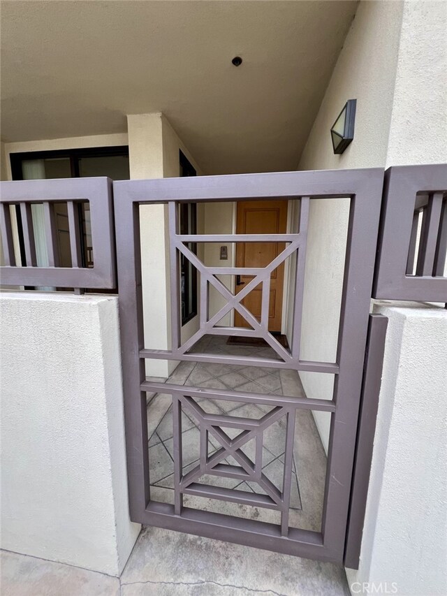 11847 Gorham Ave Unit 403, Los Angeles, CA 90049 - view of exterior entry with stucco siding