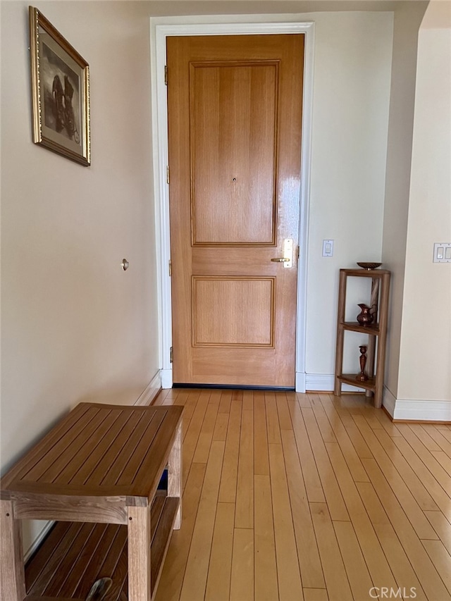 11847 Gorham Ave Unit 403, Los Angeles, CA 90049 - entryway with light wood-style floors and baseboards