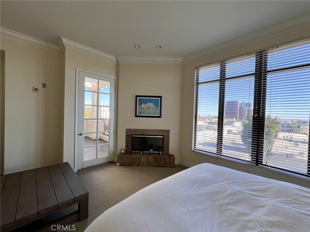 11847 Gorham Ave Unit 403, Los Angeles, CA 90049 - bedroom with baseboards, a fireplace, crown molding, and carpet