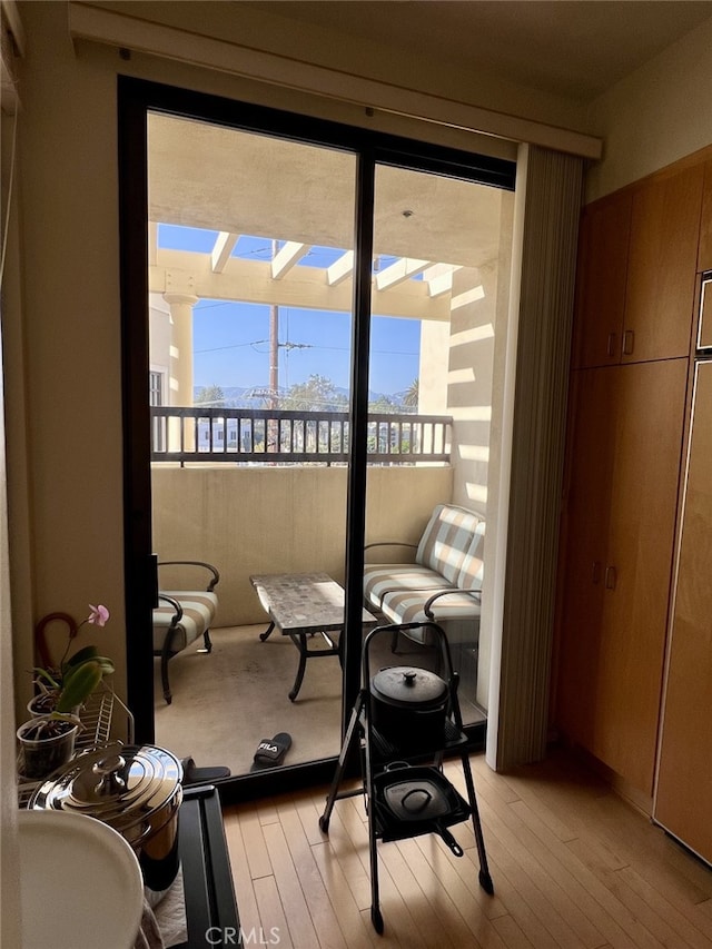 11847 Gorham Ave Unit 403, Los Angeles, CA 90049 - interior space featuring a skylight and light wood-style flooring