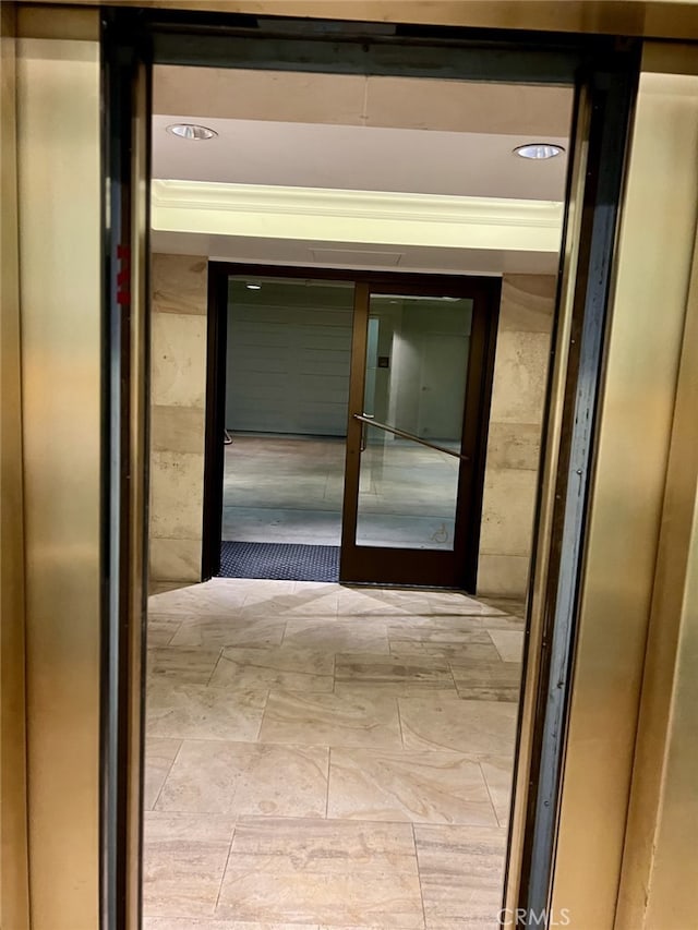 11847 Gorham Ave Unit 403, Los Angeles, CA 90049 - hall featuring elevator and recessed lighting