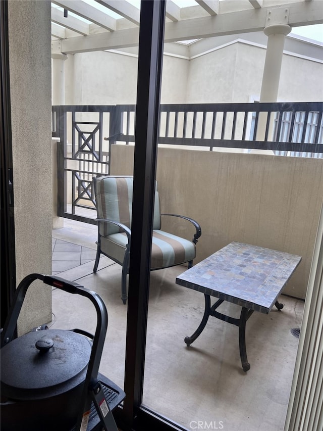 11847 Gorham Ave Unit 403, Los Angeles, CA 90049 - balcony featuring a patio area and a pergola