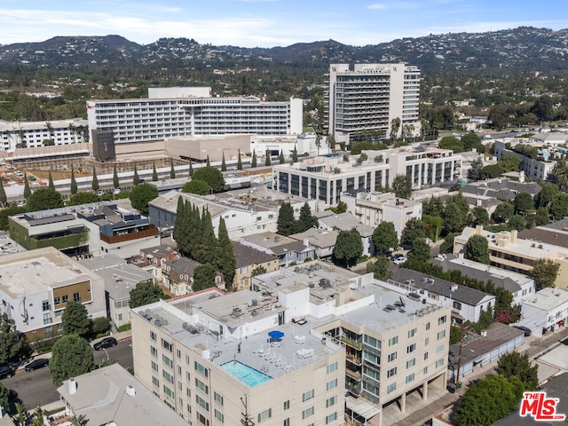 drone / aerial view featuring a mountain view