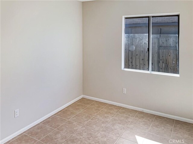 view of tiled spare room