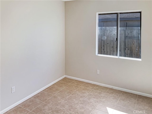 view of tiled empty room