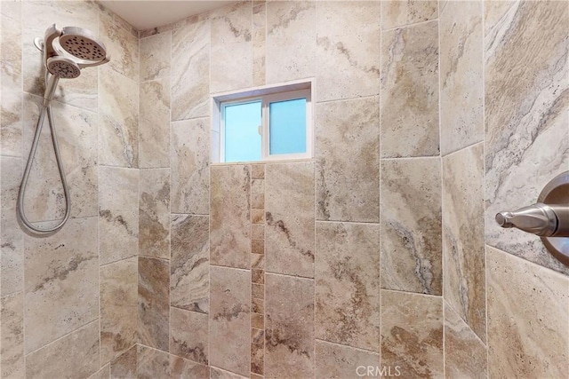 room details with a tile shower