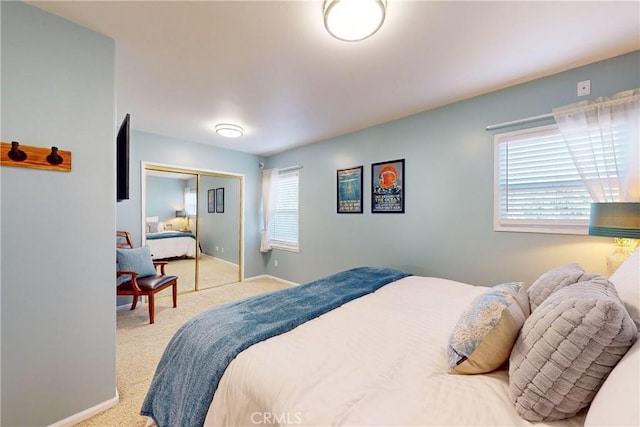 carpeted bedroom featuring a closet