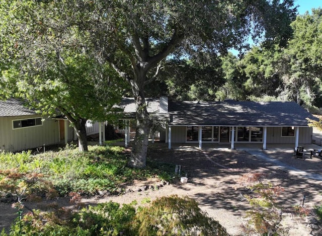 ranch-style house with a patio