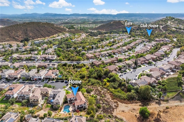 drone / aerial view featuring a mountain view