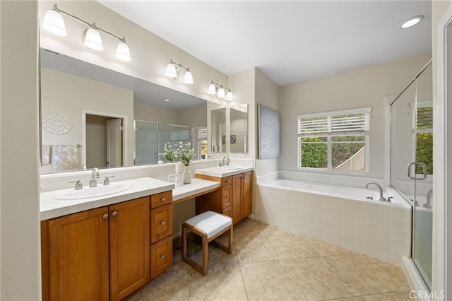 bathroom featuring plus walk in shower, tile patterned floors, and vanity