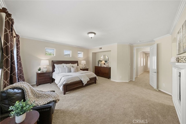 carpeted bedroom featuring ornamental molding