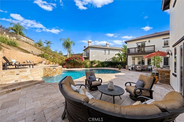 view of swimming pool with a fenced in pool, a patio area, fence, an in ground hot tub, and an outdoor living space