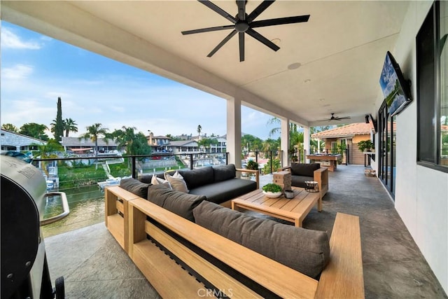 view of patio / terrace with outdoor lounge area and a ceiling fan