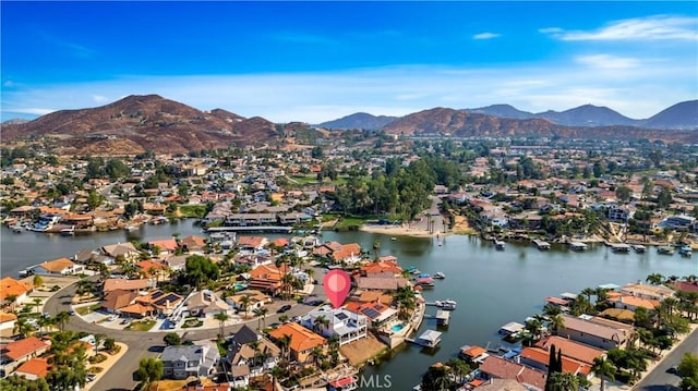 bird's eye view with a residential view and a water and mountain view