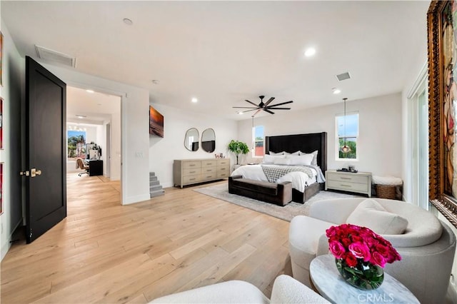 bedroom with light wood-type flooring, visible vents, and recessed lighting