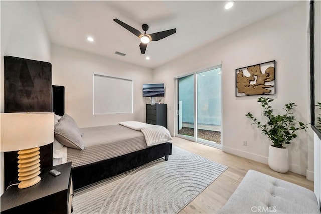 bedroom with wood finished floors, visible vents, baseboards, recessed lighting, and access to exterior