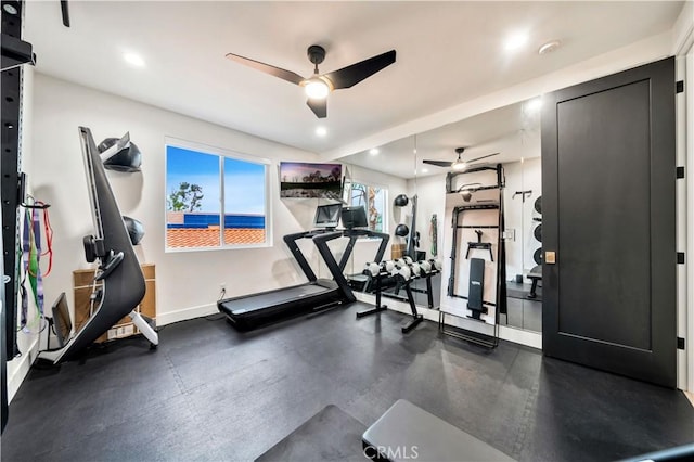 exercise area featuring recessed lighting, baseboards, and ceiling fan