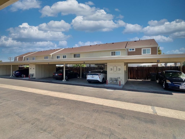 view of parking featuring a carport