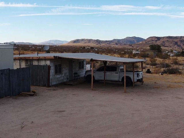 exterior space featuring a mountain view